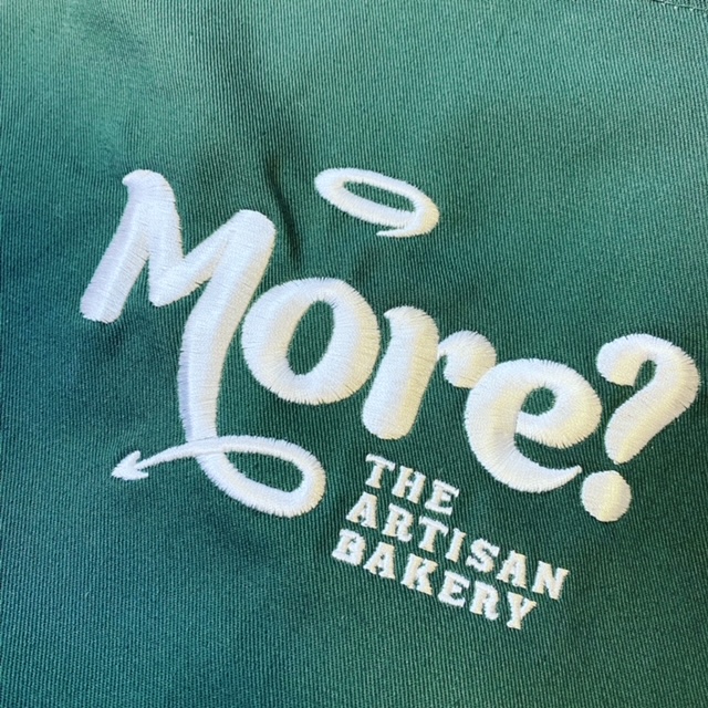 medium logo on aprons